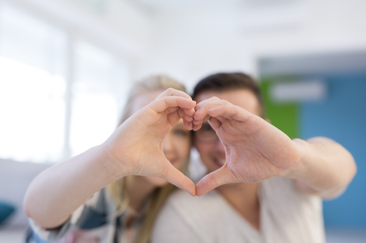 Vecteezy couple making heart with hands 10992784